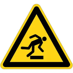 Struikelgevaar waarschuwingspictogram - W007 - geel zwart - driehoekig - symbool struikelend persoon op gele achtergrond