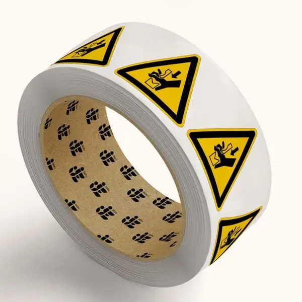 Knelling waarschuwingssticker op rol - W030 - geel zwart - driehoekig - symbool hand tussen pers en pijl op gele achtergrond