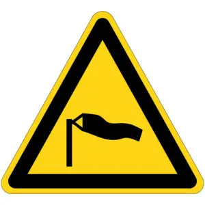 Harde wind waarschuwingspictogram - W064 - driehoekig - geel zwart - symbool vlag in de wind